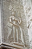 Angkor Wat temple, the fourth enclosure, the bas reliefs of the west gopura, superbly preserved devatas, either individually or in groups of two or three, amongst the finest in the monument. 